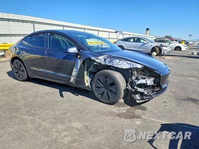 Czwarte zdjęcie samochodu z boku: 2024 TESLA MODEL 3 VIN:5YJ3E1EB3RF735584 - miniatura