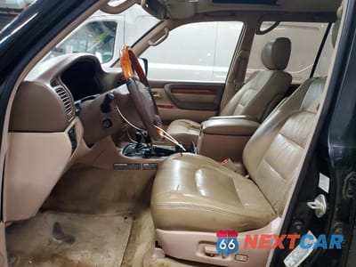 Zdjęcie 7 z 13 samochodu: 2002 LEXUS LX 470 VIN:JTJHT00W723516093 - miniatura