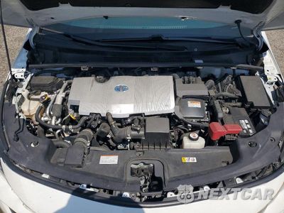 Zdjęcie 11 z 12 samochodu: 2021 TOYOTA PRIUS PRIME LE VIN:JTDKAMFP5M3175754 - miniatura