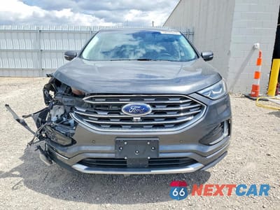 Piąte zdjęcie samochodu w środku: 2019 FORD EDGE TITANIUM VIN:2FMPK4K97KBB86192 - miniatura