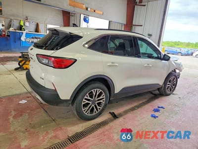Trzecie zdjęcie samochodu z tyłu: 2020 FORD ESCAPE SEL VIN:1FMCU9H68LUA27115 - miniatura