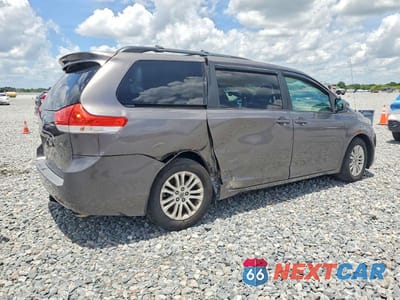 Czwarte zdjęcie samochodu z boku: 2011 TOYOTA SIENNA XLE 8-PASSENGER VIN:5TDYK3DC4BS079112 - miniatura