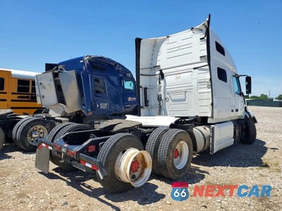 Czwarte zdjęcie samochodu z boku: 2022 VOLVO VNL SEMI TRUCK VIN:4V4NC9EH9NN304751 - miniatura