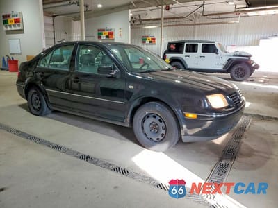 Czwarte zdjęcie samochodu z boku: 2004 VOLKSWAGEN JETTA GL VIN:3VWRK69M14M051999 - miniatura