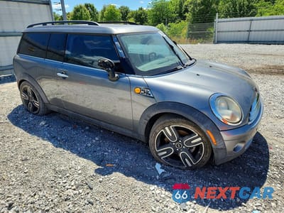 Czwarte zdjęcie samochodu z boku: 2010 MINI COOPER CLUBMAN VIN:WMWML3C57ATX38960 - miniatura