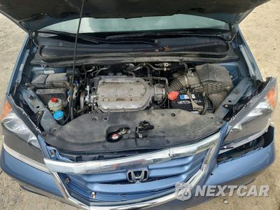 Zdjęcie 12 z 13 samochodu: 2010 HONDA ODYSSEY EXL VIN:5FNRL3H69AB077364 - miniatura