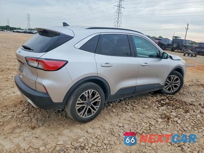 Trzecie zdjęcie samochodu z tyłu: 2020 FORD ESCAPE SEL VIN:1FMCU0H64LUA22523 - miniatura