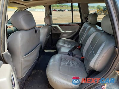 Zdjęcie 10 z 12 samochodu: 2002 JEEP GRAND CHEROKEE VIN:1J8GW68J12C206709 - miniatura
