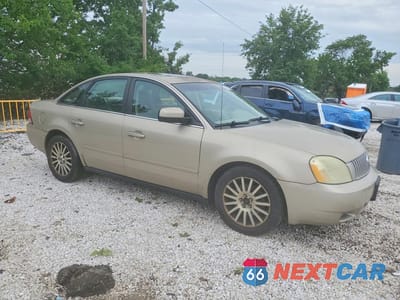 Czwarte zdjęcie samochodu z boku: 2006 MERCURY MONTEGO PREMIER VIN:1MEHM42126G600909 - miniatura