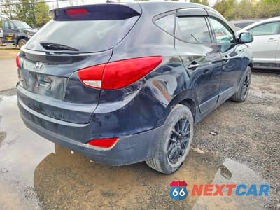 Czwarte zdjęcie samochodu z boku: 2015 HYUNDAI TUCSON GLS VIN:KM8JT3AF0FU971576 - miniatura