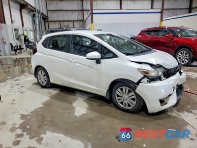 Czwarte zdjęcie samochodu z boku: 2016 HONDA FIT LX VIN:JHMGK5H57GX025533 - miniatura
