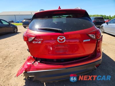 Zdjęcie 6 z 13 samochodu: 2014 MAZDA CX-5 VIN:JM3KE2CY8E0373809 - miniatura