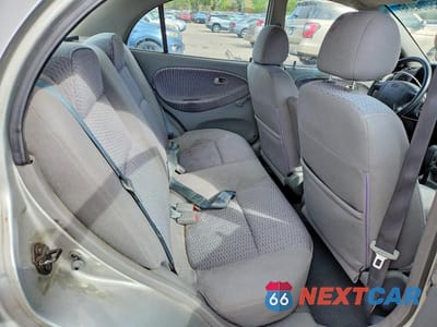 Zdjęcie 10 z 12 samochodu: 2002 KIA RIO BASE VIN:KNADC123X26198833 - miniatura
