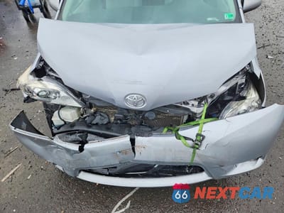 Zdjęcie 12 z 13 samochodu: 2013 TOYOTA SIENNA LE VIN:5TDKK3DCXDS390973 - miniatura