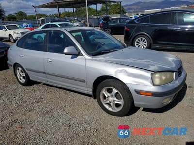Czwarte zdjęcie samochodu z boku: 2001 HYUNDAI ELANTRA GL/VE VIN:KMHDN55D31U027324 - miniatura