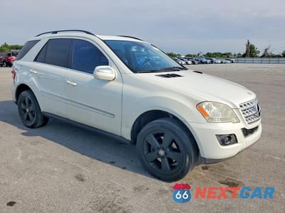 Czwarte zdjęcie samochodu z boku: 2010 MERCEDES-BENZ ML 350 4MATIC VIN:4JGBB8GBXAA622489 - miniatura