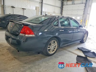 Trzecie zdjęcie samochodu z tyłu: 2014 CHEVROLET IMPALA LIMITED LTZ VIN:2G1WC5E31E1143223 - miniatura