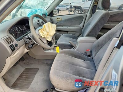Zdjęcie 7 z 12 samochodu: 2001 TOYOTA COROLLA LE VIN:1NXBR12E51Z542648 - miniatura