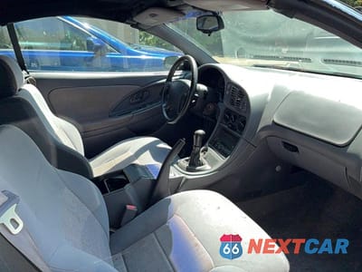 Piąte zdjęcie samochodu w środku: 1996 MITSUBISHI ECLIPSE SPYDER GS VIN:4A3AX35G7TE410564 - miniatura