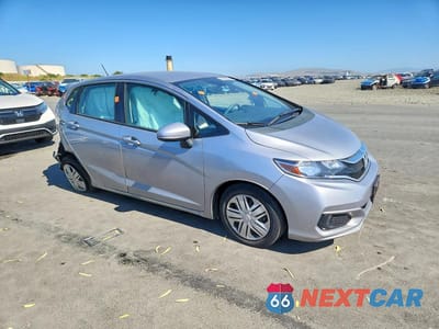 Czwarte zdjęcie samochodu z boku: 2019 HONDA FIT LX VIN:3HGGK5H45KM727665 - miniatura
