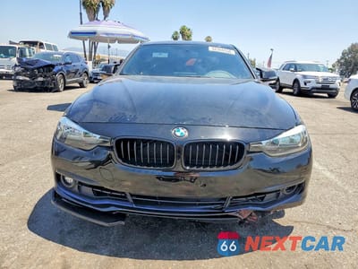 Piąte zdjęcie samochodu w środku: 2017 BMW 330 I VIN:WBA8B9C50HK675644 - miniatura