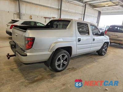 Trzecie zdjęcie samochodu z tyłu: 2014 HONDA RIDGELINE SPORT VIN:5FPYK1F73EB013722 - miniatura