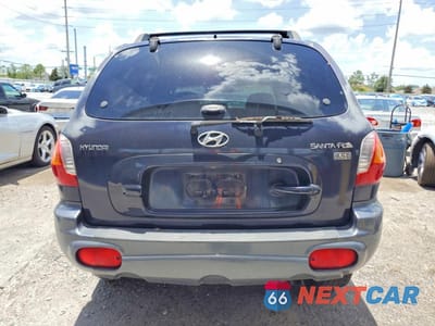 Zdjęcie 6 z 13 samochodu: 2004 HYUNDAI SANTA FE GLS VIN:KM8SC13E44U582210 - miniatura