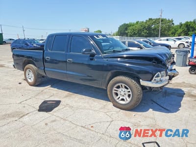 Czwarte zdjęcie samochodu z boku: 2001 DODGE DAKOTA QUAD VIN:1B7HL2ANX1S310839 - miniatura