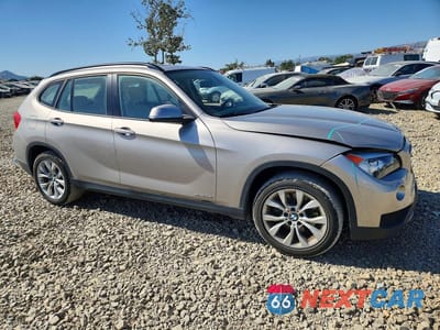 Czwarte zdjęcie samochodu z boku: 2014 BMW X1 XDRIVE28I VIN:WBAVL1C50EVY24419 - miniatura