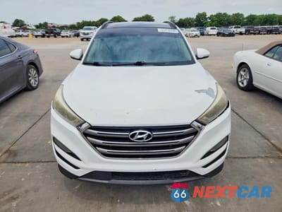 Piąte zdjęcie samochodu w środku: 2016 HYUNDAI TUCSON LIMITED VIN:KM8J33A27GU087259 - miniatura