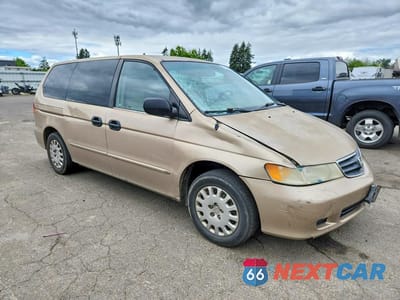 Czwarte zdjęcie samochodu z boku: 2002 HONDA ODYSSEY LX VIN:2HKRL18572H519590 - miniatura