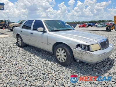 Czwarte zdjęcie samochodu z boku: 2003 MERCURY GRAND MARQUIS LS VIN:2MEFM75W93X675953 - miniatura
