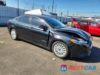 Czwarte zdjęcie samochodu z boku: 2015 FORD FUSION SE HYBRID VIN:3FA6P0LU1FR214160 - miniatura