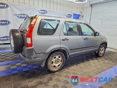 Trzecie zdjęcie samochodu z tyłu: 2005 HONDA CR-V LX VIN:SHSRD68595U309370 - miniatura