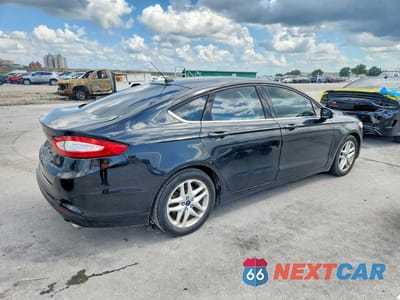 Trzecie zdjęcie samochodu z tyłu: 2015 FORD FUSION SE VIN:3FA6P0H7XFR136481 - miniatura
