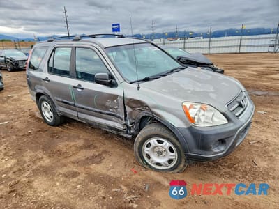 Czwarte zdjęcie samochodu z boku: 2005 HONDA CR-V LX VIN:JHLRD78545C048128 - miniatura
