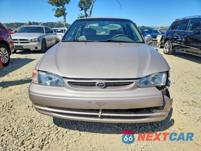 Piąte zdjęcie samochodu w środku: 1999 TOYOTA COROLLA VE VIN:1NXBR12EXXZ238871 - miniatura
