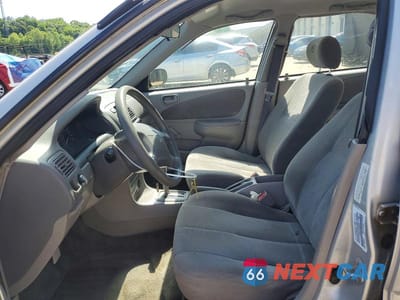 Zdjęcie 7 z 12 samochodu: 2002 TOYOTA COROLLA CE VIN:2T1BR12E02C558985 - miniatura