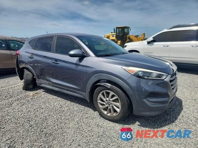 Czwarte zdjęcie samochodu z boku: 2018 HYUNDAI TUCSON SE VIN:KM8J23A40JU619687 - miniatura