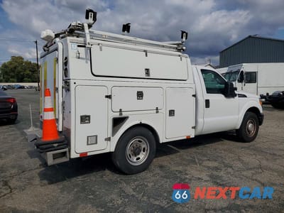 Trzecie zdjęcie samochodu z tyłu: 2013 FORD F350 SUPER DUTY VIN:1FDRF3A66DEB92605 - miniatura