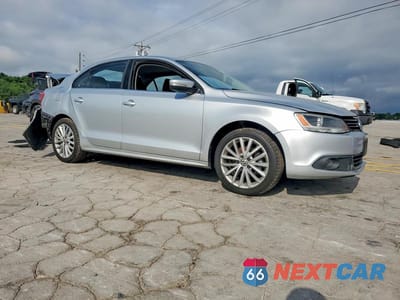 Czwarte zdjęcie samochodu z boku: 2014 VOLKSWAGEN JETTA SEL VIN:3VWL17AJ3EM404132 - miniatura