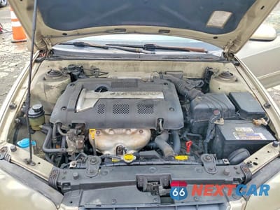 Zdjęcie 11 z 12 samochodu: 2005 HYUNDAI ELANTRA GLS VIN:KMHDN46D75U154513 - miniatura