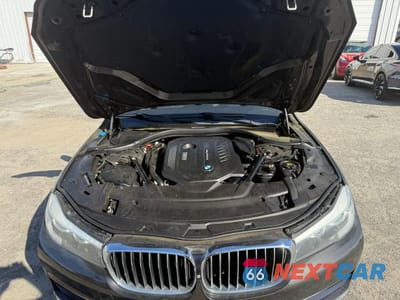Zdjęcie 7 z 10 samochodu: 2016 BMW 740 I VIN:WBA7E2C52GG503997 - miniatura