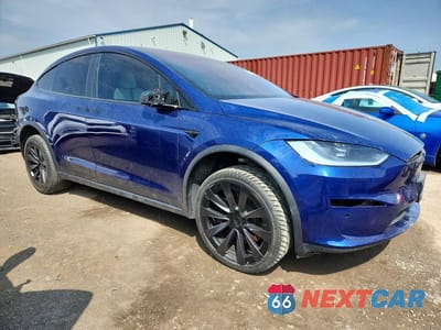 Czwarte zdjęcie samochodu z boku: 2023 TESLA MODEL X VIN:7SAXCBE59PF376085 - miniatura