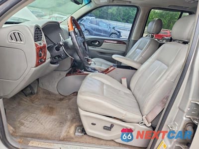 Zdjęcie 7 z 13 samochodu: 2006 GMC ENVOY DENALI VIN:1GKES63M562238722 - miniatura