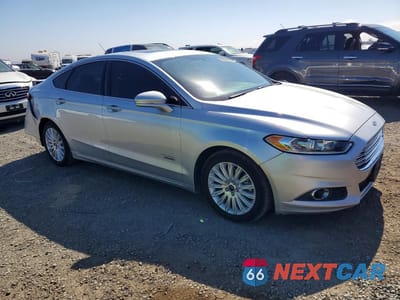 Czwarte zdjęcie samochodu z boku: 2014 FORD FUSION SE PHEV VIN:3FA6P0PU6ER269745 - miniatura