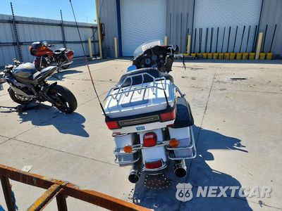 Czwarte zdjęcie samochodu z boku: 2009 HARLEY DAVIDSON FLHTCU VIN:1HD1FC4169Y624261 - miniatura