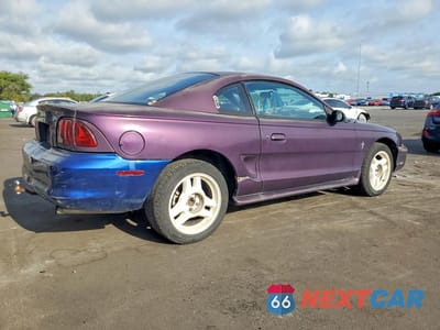 Trzecie zdjęcie samochodu z tyłu: 1996 FORD MUSTANG VIN:1FALP4042TF170001 - miniatura