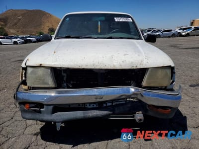 Piąte zdjęcie samochodu w środku: 1998 TOYOTA TACOMA XTRACAB VIN:4TAVN52N3WZ160483 - miniatura