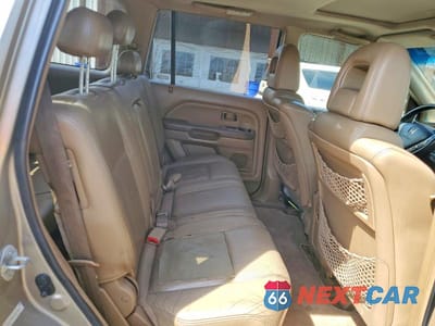 Zdjęcie 10 z 12 samochodu: 2005 HONDA PILOT EXL VIN:2HKYF18705H529046 - miniatura